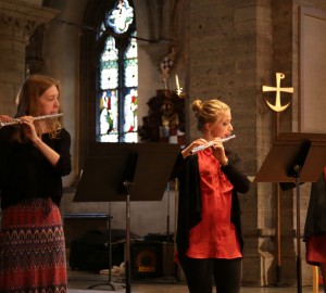 Tre flöjtspelare i Nicolaikyrkan