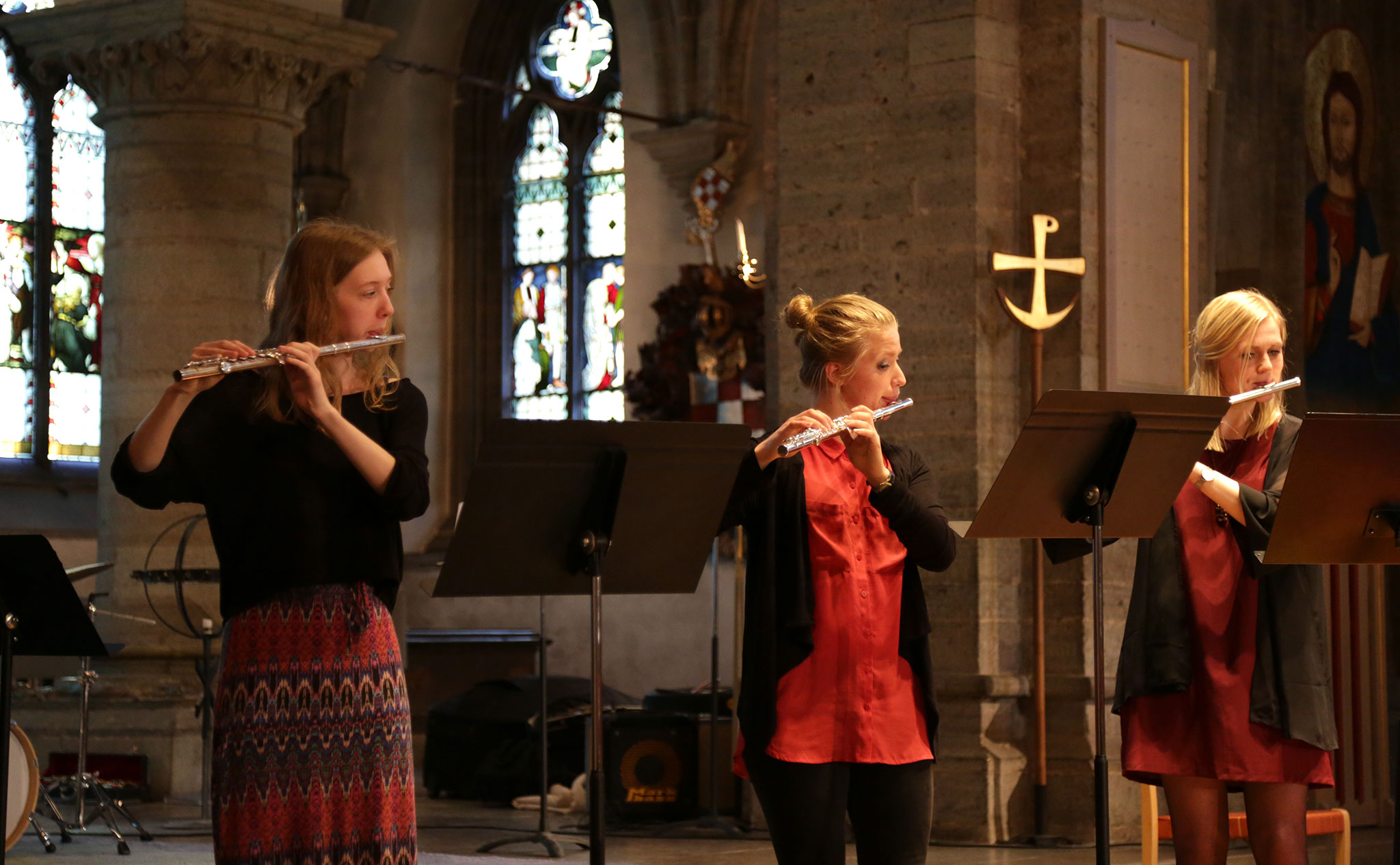 Tre flöjtspelare i Nicolaikyrkan